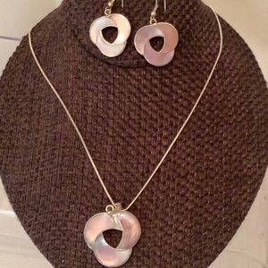 Silver necklace with abalone shell necklace and earring set. Pink to purple